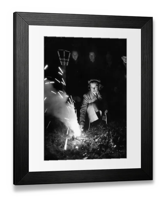 Framed Print : Lighting A Firework Framed Print : Lighting A Firework