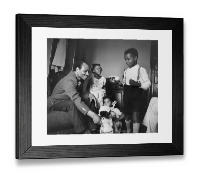 Framed Print : Daddy. 6th September 1952: A Jamaican father with his young family at their Framed Print : Daddy. 6th September 1952: A Jamaican father with his young family at their