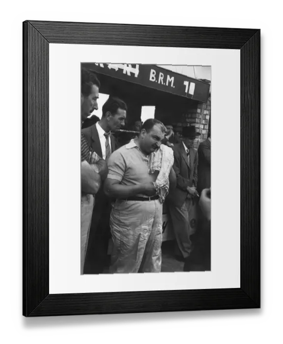 Framed Print : Sad Loser. 2nd August 1952: BRM driver Jose Froilan Gonzalez wipes away Framed Print : Sad Loser. 2nd August 1952: BRM driver Jose Froilan Gonzalez wipes away