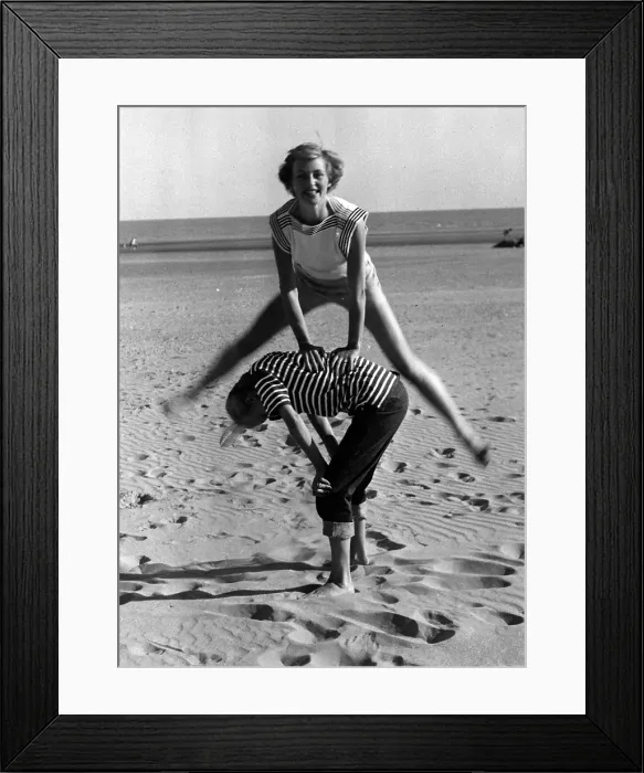 Framed Print : Leap-frog. 21st June 1952: Towelling beachwear fashion Framed Print : Leap-frog. 21st June 1952: Towelling beachwear fashion