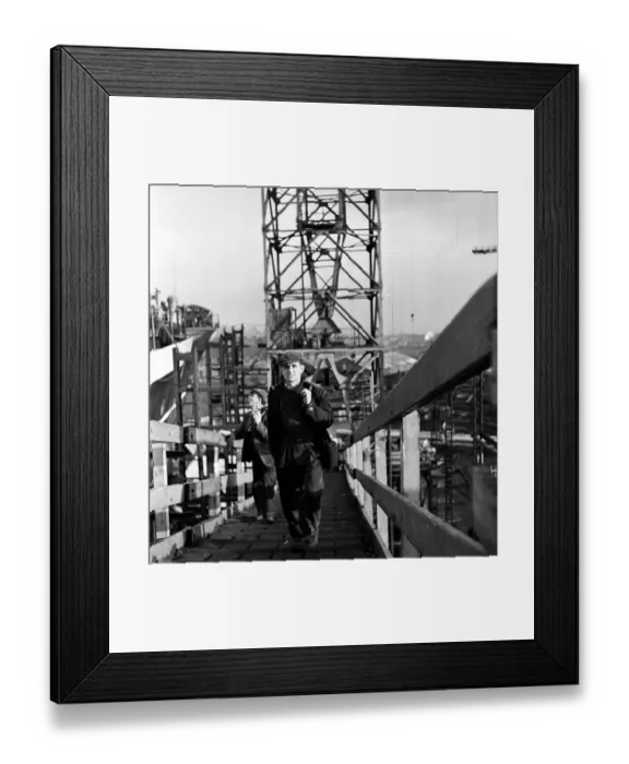 Framed Print : Gangplank. 15th March 1952: Workmen climbing the steps leading up to the Framed Print : Gangplank. 15th March 1952: Workmen climbing the steps leading up to the