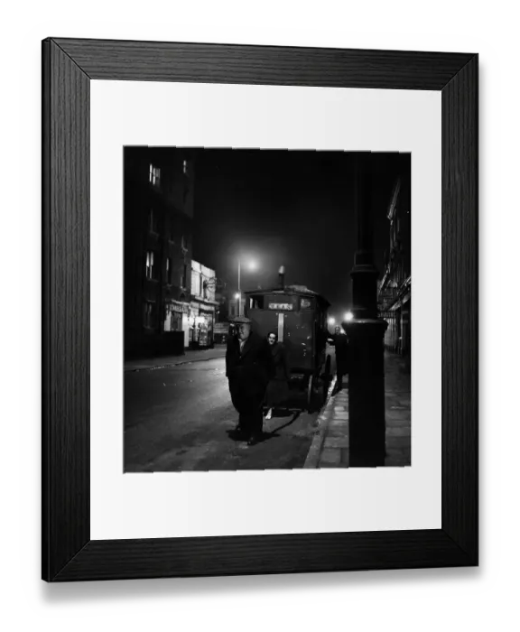 Framed Print : Tea Stall. A couple pulling their tea stall through the dark deserted streets Framed Print : Tea Stall. A couple pulling their tea stall through the dark deserted streets