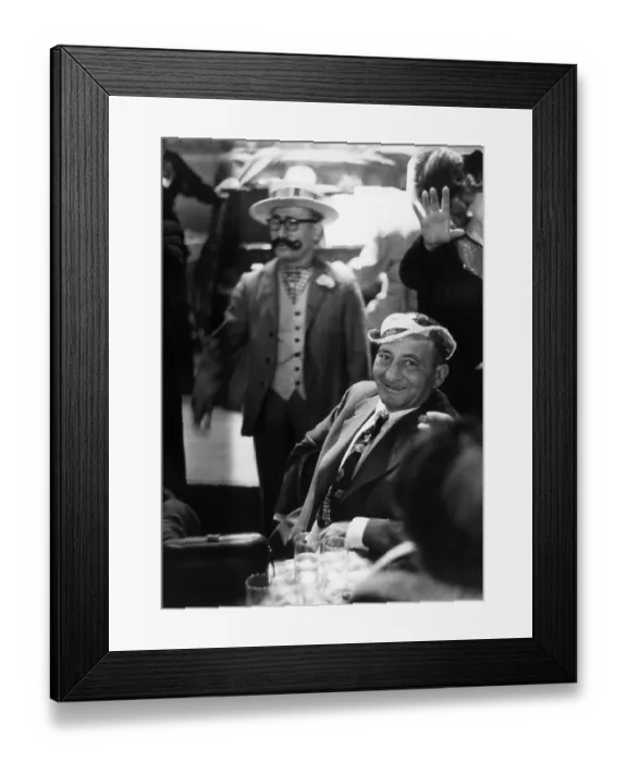 Framed Print : Pub Pals. 14th December 1951: A happy customer wears a party hat in a New York bar Framed Print : Pub Pals. 14th December 1951: A happy customer wears a party hat in a New York bar