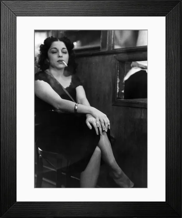 Framed Print : Bar Babe. 14th December 1951: A woman having a cigarette break by the service Framed Print : Bar Babe. 14th December 1951: A woman having a cigarette break by the service