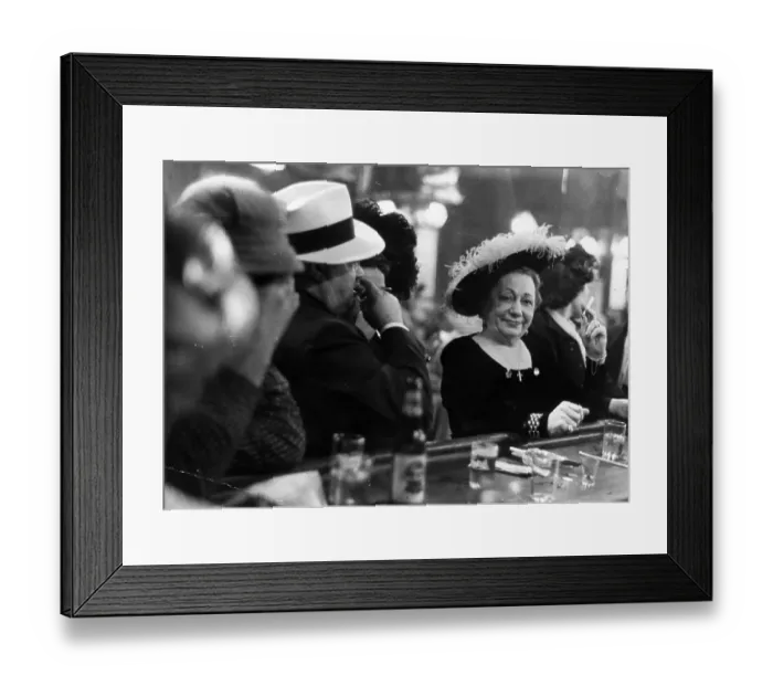 Framed Print : Bar Flies. 14th December 1951: A woman wearing an ostrich feather trimmed Framed Print : Bar Flies. 14th December 1951: A woman wearing an ostrich feather trimmed