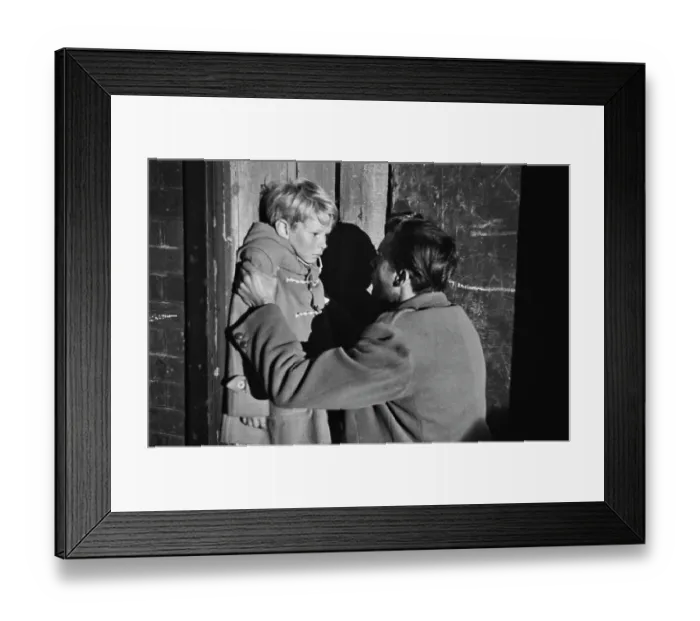 Framed Print : Hunted. English actor, Dirk Bogarde and Scottish child actor Framed Print : Hunted. English actor, Dirk Bogarde and Scottish child actor