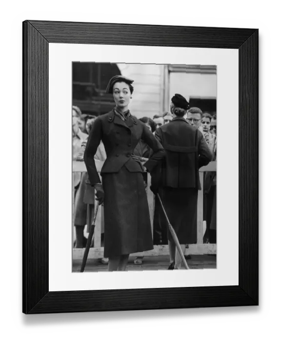 Framed Print : Dior Suit. Christian Dior's classic suit accentuates the waist by a cut away basque Framed Print : Dior Suit. Christian Dior's classic suit accentuates the waist by a cut away basque