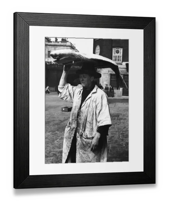 Framed Print : Fish Head. 26th May 1951: A trader at Billingsgate Market Framed Print : Fish Head. 26th May 1951: A trader at Billingsgate Market