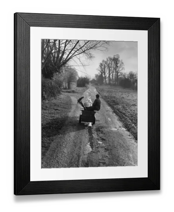 Framed Print : Commuter. Mrs Olive Walker, one of the few woman sweeps in Britain, on her way to work
