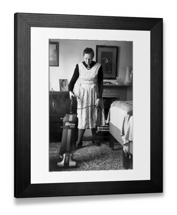 Framed Print : Hoovering. 1951: A housewife doing her hoovering Framed Print : Hoovering. 1951: A housewife doing her hoovering