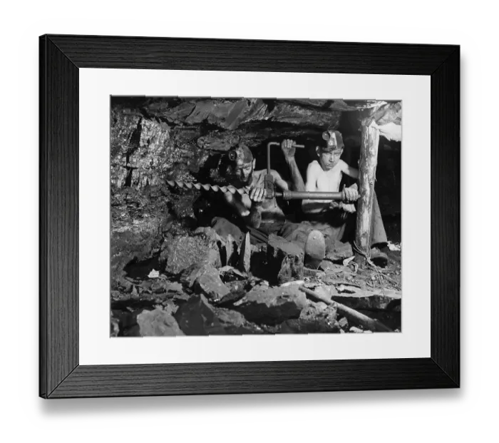 Framed Print : Miners. Two miners fixing a pit support in a mine Framed Print : Miners. Two miners fixing a pit support in a mine