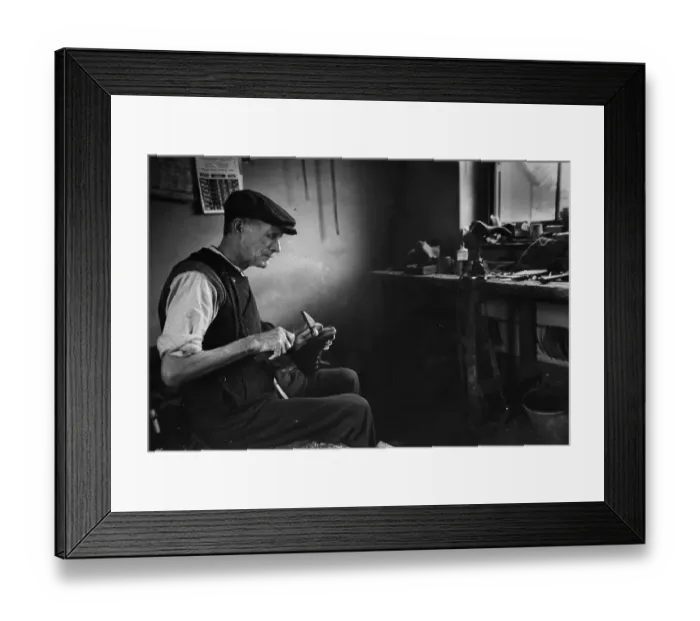 Framed Print : Cobbler. Mr Pollard, a shoe-maker, at work in his workshop in Yorkshire Framed Print : Cobbler. Mr Pollard, a shoe-maker, at work in his workshop in Yorkshire