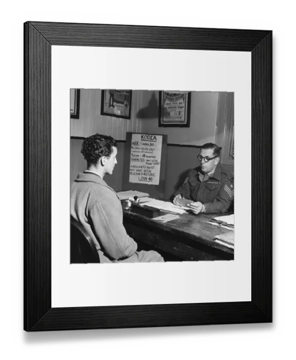 Framed Print : Recruit. A Sergeant Major interviews one of the many volunteers for service in Korea Framed Print : Recruit. A Sergeant Major interviews one of the many volunteers for service in Korea
