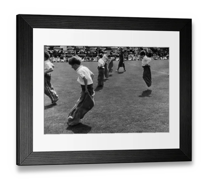 Framed Print : Sack Race. 19th August 1950: Schoolboys competing in the sack race at Eaton Framed Print : Sack Race. 19th August 1950: Schoolboys competing in the sack race at Eaton