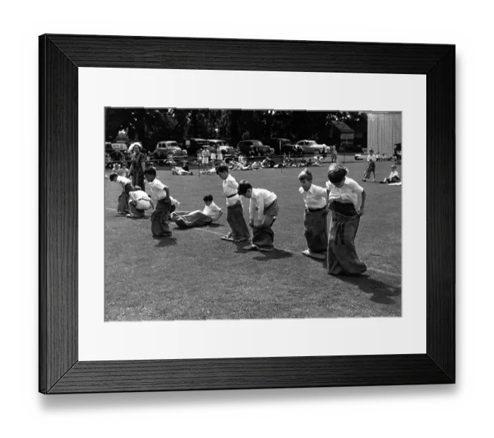 Framed Print : Sack Race. Competitors in the traditional school sports day sack race Framed Print : Sack Race. Competitors in the traditional school sports day sack race