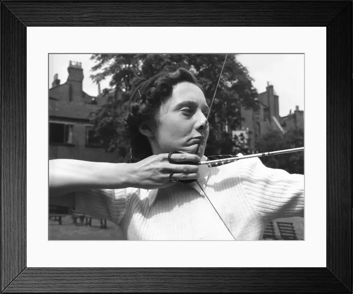 Framed Print : Bow Woman. 5th August 1950: A woman archer drawing her bow Framed Print : Bow Woman. 5th August 1950: A woman archer drawing her bow