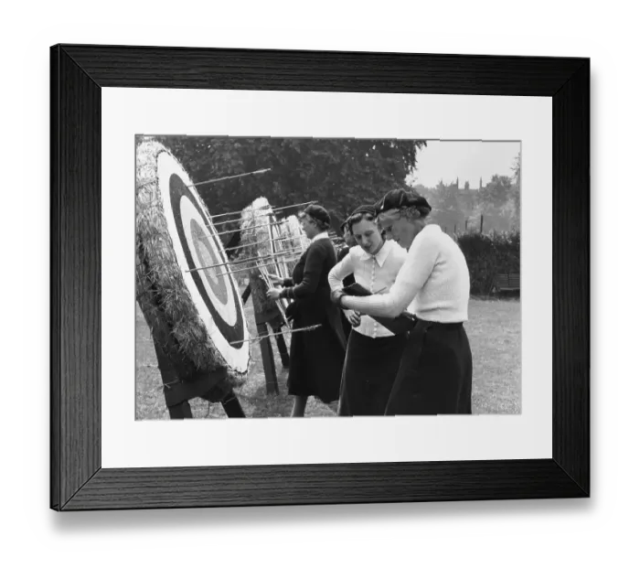 Framed Print : Archery. 5th August 1950: Archery officials writing down the scores during Framed Print : Archery. 5th August 1950: Archery officials writing down the scores during