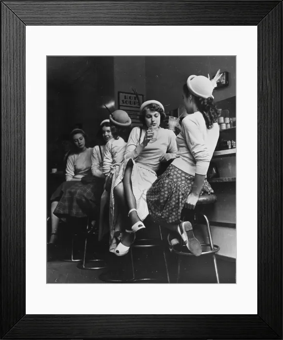 Framed Print : Milk Bar. Teenagers drinking milkshakes in a milk bar Framed Print : Milk Bar. Teenagers drinking milkshakes in a milk bar