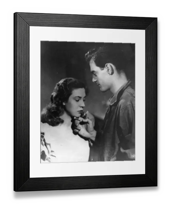 Framed Print : Paisa. October 1948: A tender moment from the film Paisa showing Gary Moore Framed Print : Paisa. October 1948: A tender moment from the film Paisa showing Gary Moore