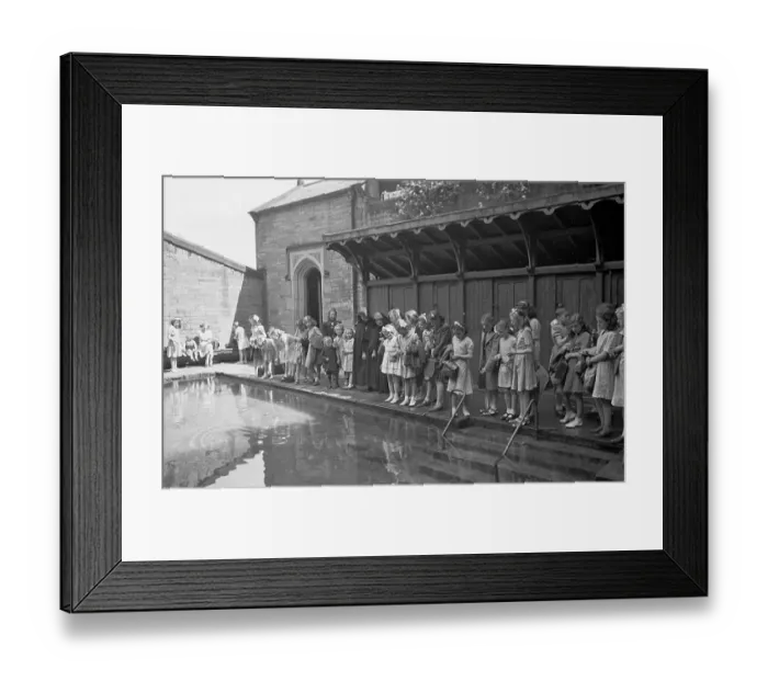 Framed Print : Holy Pool. 24th July 1948: Children line up along the edge of the pool Framed Print : Holy Pool. 24th July 1948: Children line up along the edge of the pool