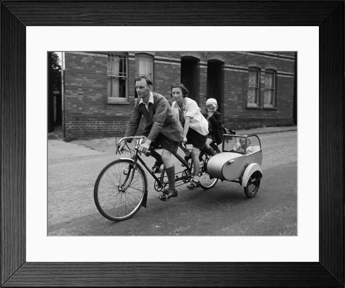 Framed Print : Family On Wheels