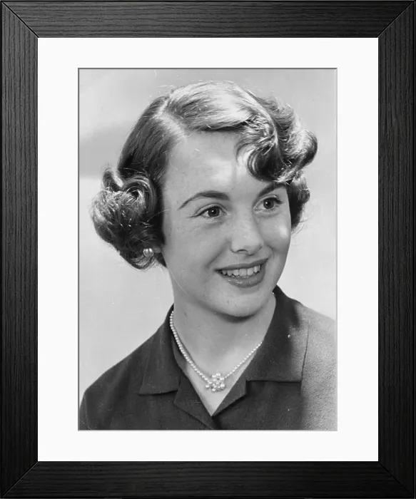 Framed Print : Ann South. 1948: English film actress and model Ann South with her hair Framed Print : Ann South. 1948: English film actress and model Ann South with her hair