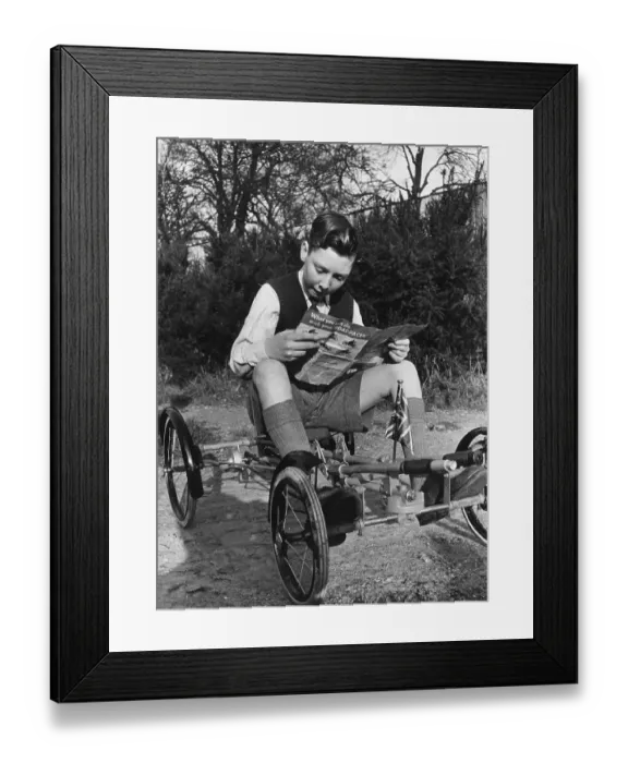 Framed Print : Roadpacer. 18th January 1947: A schoolboy sits on his new Roadpacer go Framed Print : Roadpacer. 18th January 1947: A schoolboy sits on his new Roadpacer go