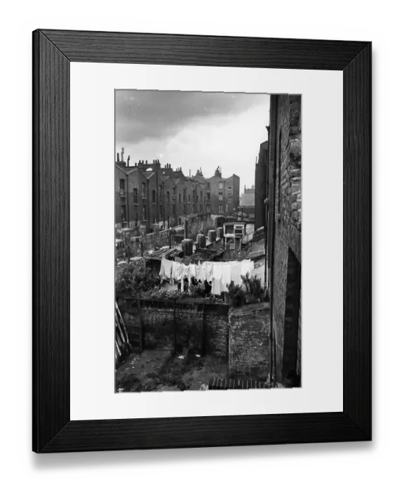Framed Print : Wash Day. 5th October 1946: A mass of clothes hanging on the washing line Framed Print : Wash Day. 5th October 1946: A mass of clothes hanging on the washing line