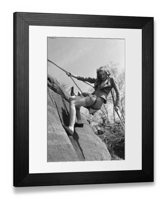 Framed Print : Abseiling. 17th August 1946: A beginner abseiling down Harrisons Rocks, Groombridge, Kent Framed Print : Abseiling. 17th August 1946: A beginner abseiling down Harrisons Rocks, Groombridge, Kent