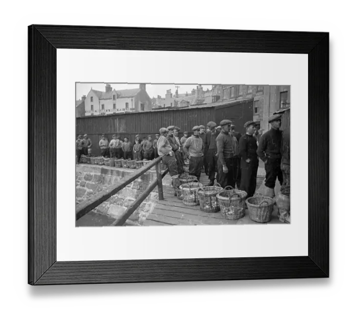 Framed Print : Fishermen. 17th August 1946: Fishermen with samples of their catch in baskets Framed Print : Fishermen. 17th August 1946: Fishermen with samples of their catch in baskets