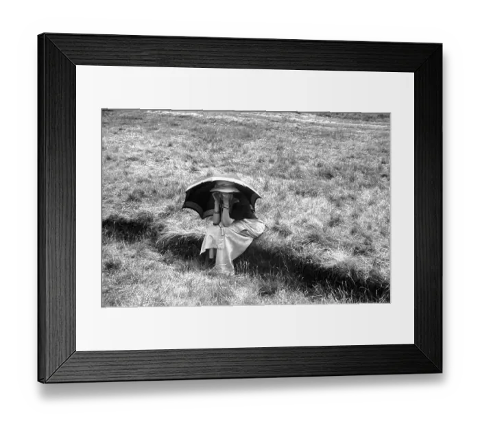Framed Print : Sun Shade. 27th July 1946: A specatator sheltering Framed Print : Sun Shade. 27th July 1946: A specatator sheltering