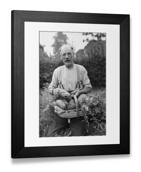 Framed Print : A Man With Vegetables