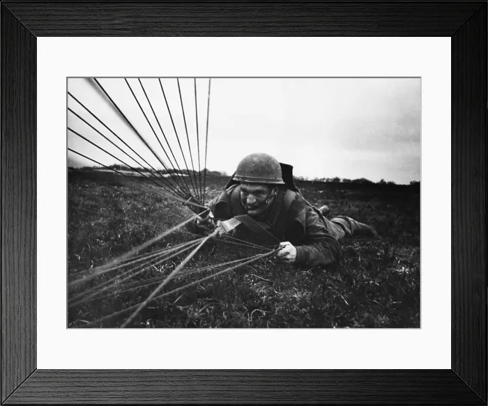 Framed Print : Paratrooper Lands Framed Print : Paratrooper Lands