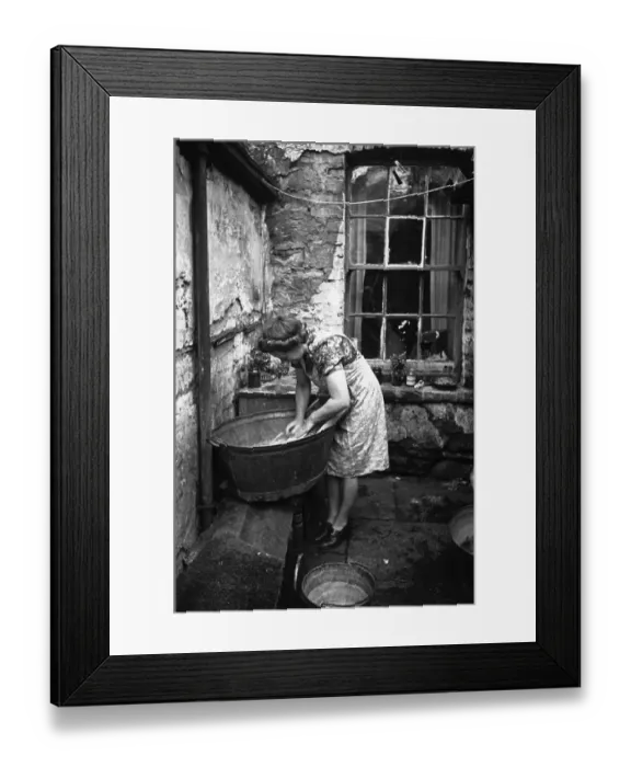 Framed Print : Wash Tub. 1st January 1944: A Welsh housewife doing the washing in a tub in the back yard Framed Print : Wash Tub. 1st January 1944: A Welsh housewife doing the washing in a tub in the back yard