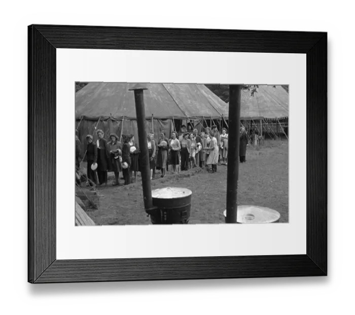Framed Print : Meal Time. Volunteer land workers queue for their main meal by the mess tent Framed Print : Meal Time. Volunteer land workers queue for their main meal by the mess tent