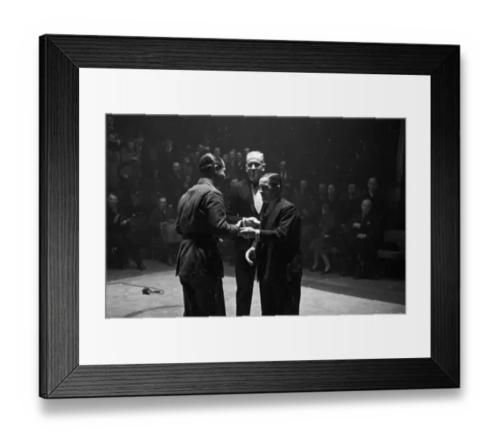 Framed Print : GI Winner. Sergeant Maurice Roy of the US Army is presented with a prize Framed Print : GI Winner. Sergeant Maurice Roy of the US Army is presented with a prize