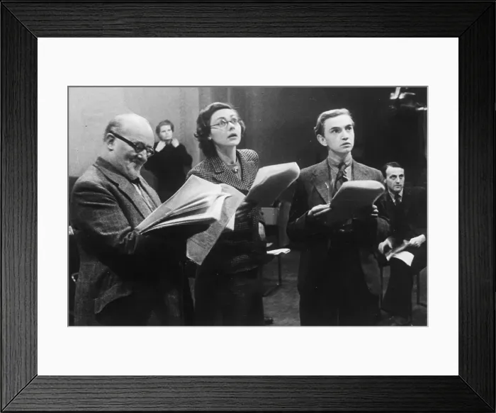 Framed Print : Reading For The Radio