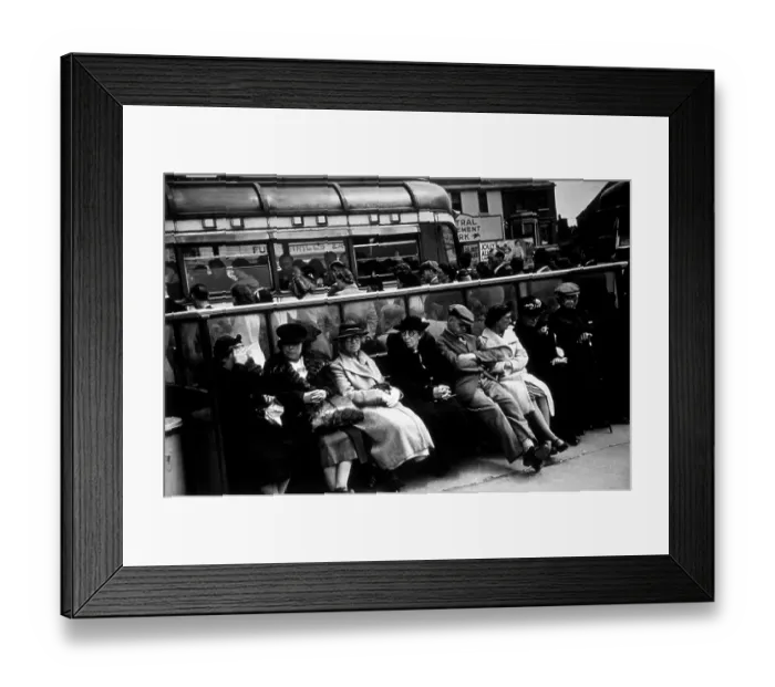 Framed Print : Bus Stop. 29th August 1942: Senior citizens waiting for a bus after an Framed Print : Bus Stop. 29th August 1942: Senior citizens waiting for a bus after an