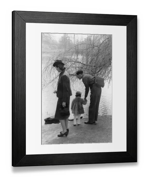 Framed Print : On Leave. 2nd May 1942: A soldier home on leave with his family at Kew Gardens in London Framed Print : On Leave. 2nd May 1942: A soldier home on leave with his family at Kew Gardens in London