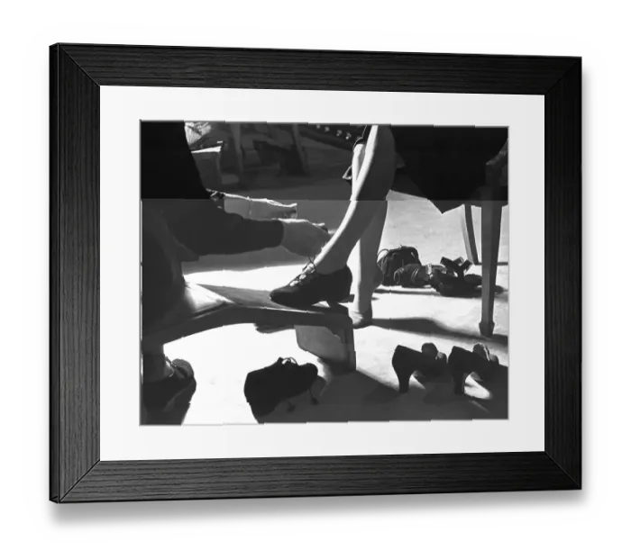 Framed Print : Lace Ups. March 1941: A woman trying on shoes in a shoe shop Framed Print : Lace Ups. March 1941: A woman trying on shoes in a shoe shop