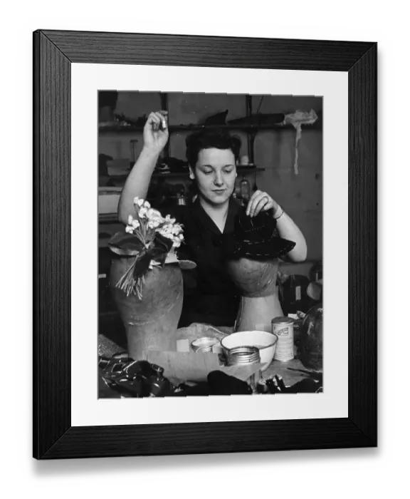 Framed Print : Hat Maker. March 1940: In the workroom a milliner handstitches the felt Framed Print : Hat Maker. March 1940: In the workroom a milliner handstitches the felt