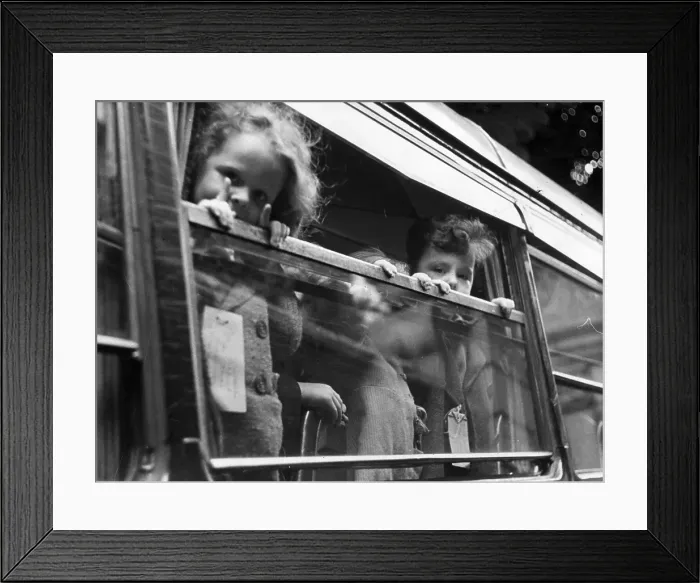 Framed Print : Evacuees, with labels tied to their clothes, at the window of a railway Framed Print : Evacuees, with labels tied to their clothes, at the window of a railway