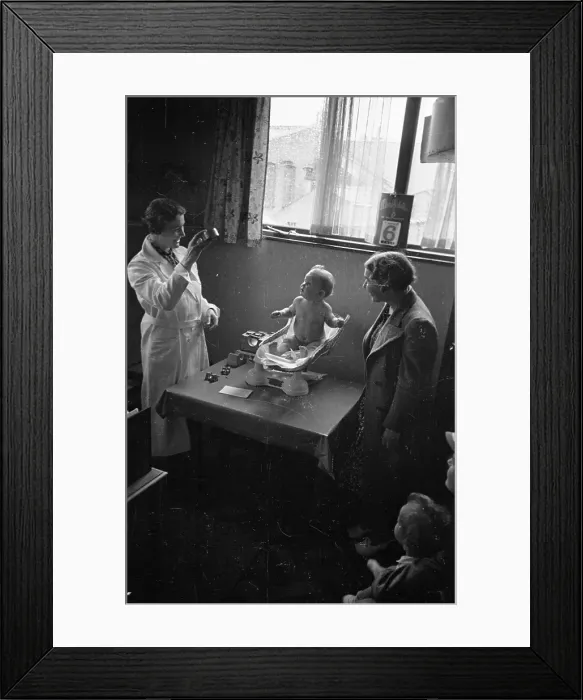 Framed Print : Weighing Baby Framed Print : Weighing Baby