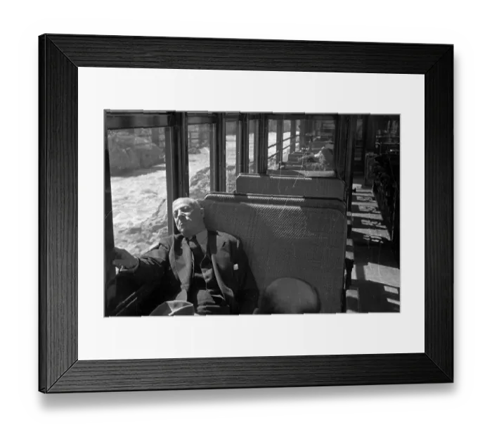 Framed Print : Sundozer. 24th June 1939: A passenger dozing whilst the sun shines on him Framed Print : Sundozer. 24th June 1939: A passenger dozing whilst the sun shines on him