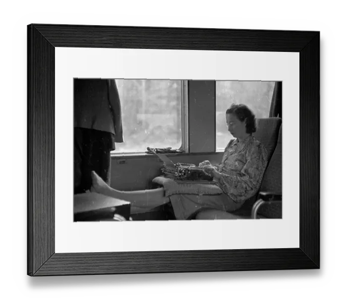 Framed Print : Typing Passenger Framed Print : Typing Passenger