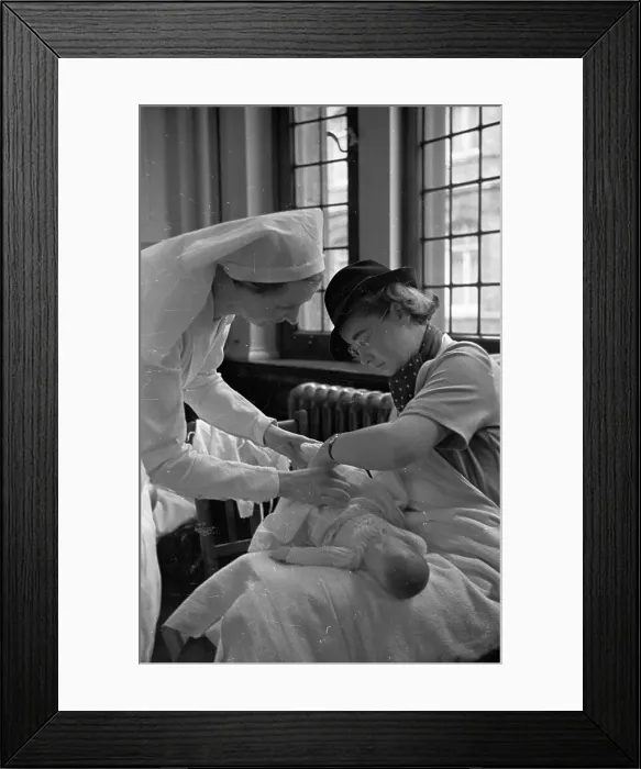 Framed Print : Changing Baby Framed Print : Changing Baby