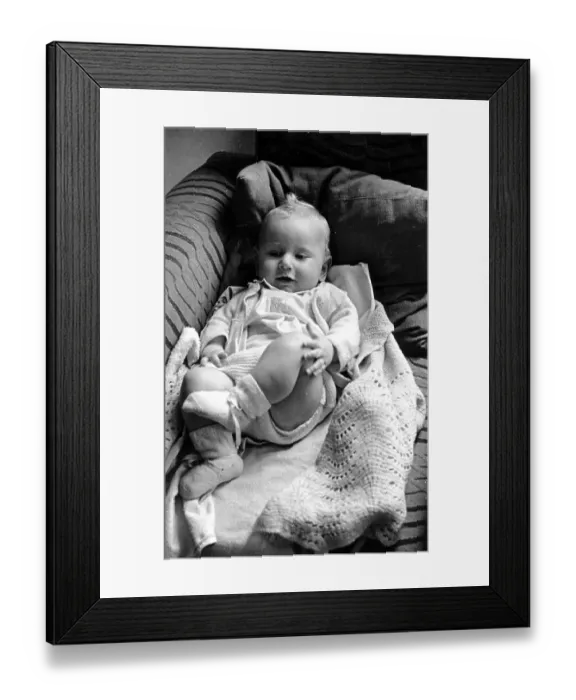 Framed Print : Baby On Settee Framed Print : Baby On Settee