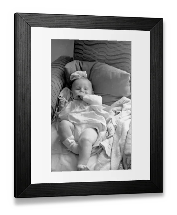 Framed Print : Baby On Sofa Framed Print : Baby On Sofa