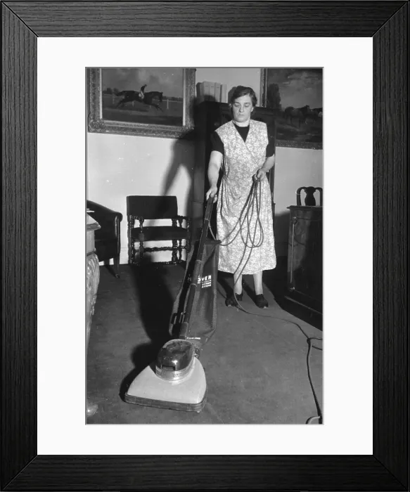 Framed Print : Vacuuming Charlady Framed Print : Vacuuming Charlady