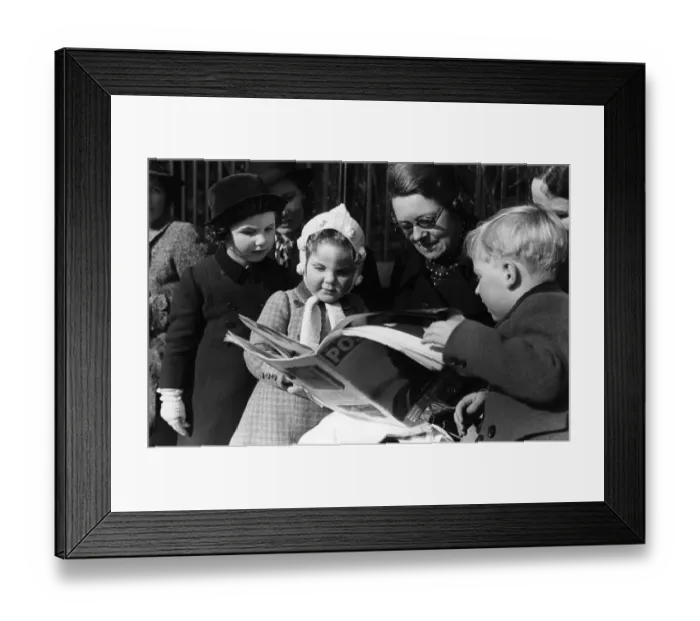 Framed Print : Looking At Magazine Framed Print : Looking At Magazine
